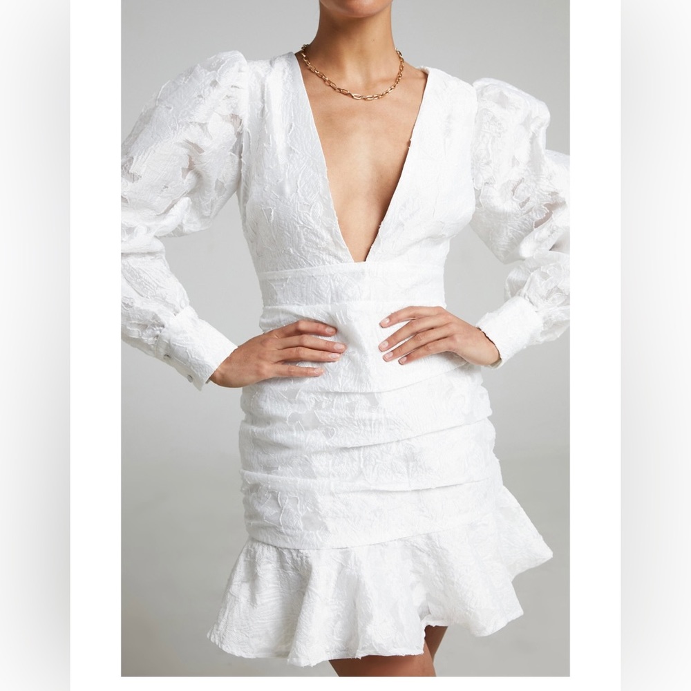 Balloon sleeve, white mini dress 97%polyester and 3% spandex.